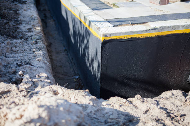 Professional Waterproofing technician working in Waldorf, MD